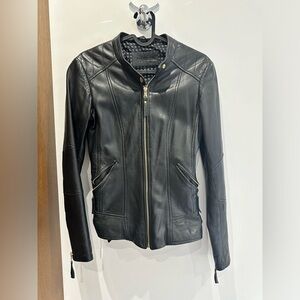 Black Danier leather jacket.